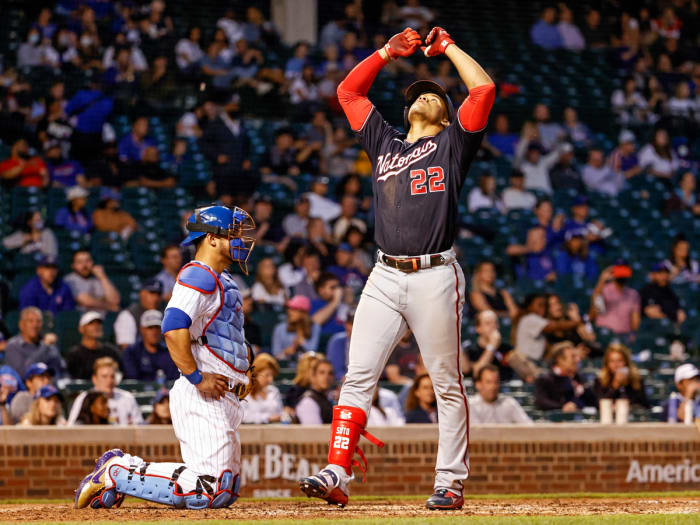 May 19, 2021; Chicago, Illinois, USA; Washington Nationals left fielder Juan Soto (22) crosses home plate after hitting a solo home run against the Chicago Cubs during the fifth inning at Wrigley Field.